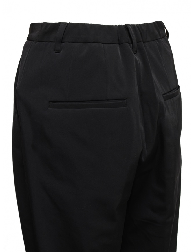 Zucca shiny black trousers with pleats for women